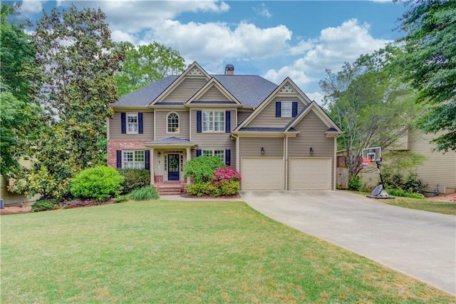 craftsman-style home featuring a front lawn and a garage