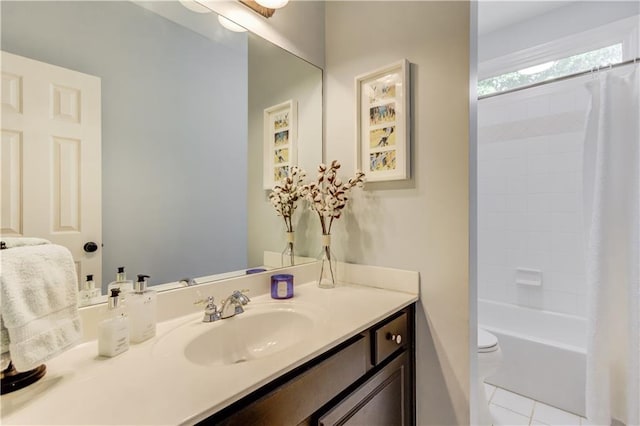 full bathroom with shower / tub combo, toilet, tile flooring, and vanity