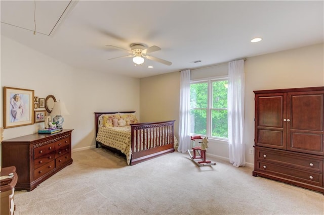 carpeted bedroom with ceiling fan