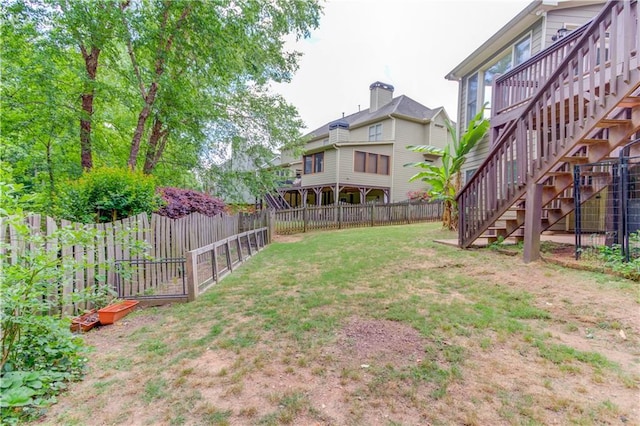 view of yard with a deck