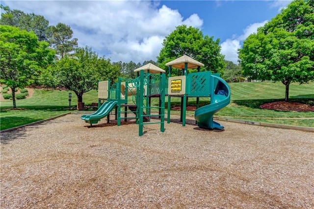 view of jungle gym featuring a yard