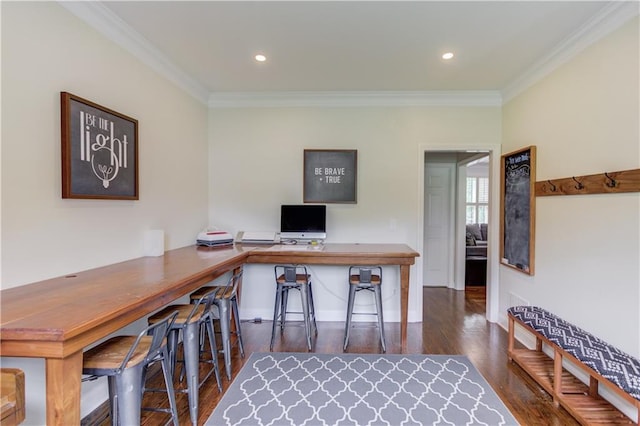 office area featuring ornamental molding and dark hardwood / wood-style floors