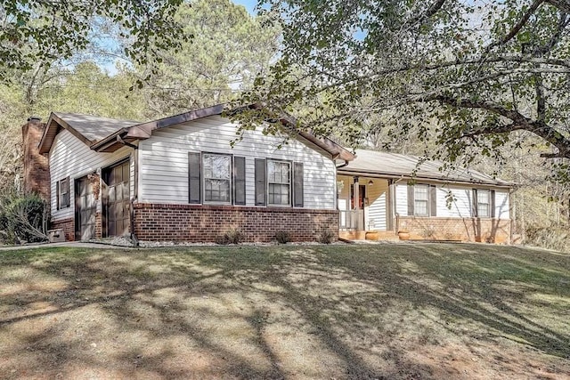 ranch-style home with a front yard