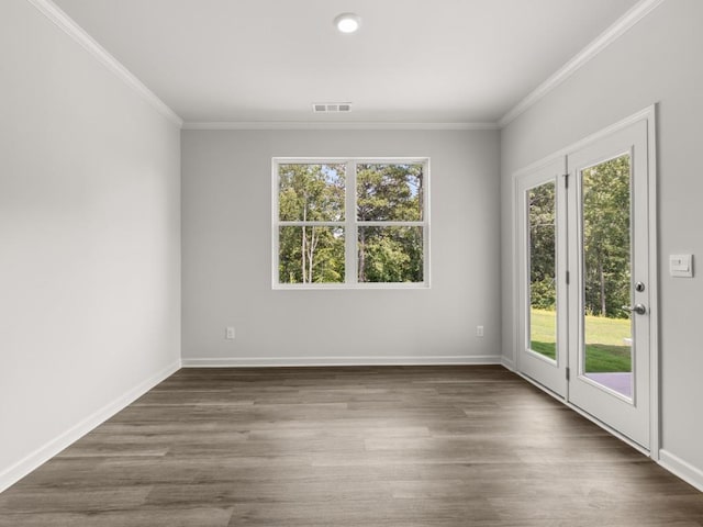 unfurnished room featuring ornamental molding, baseboards, dark wood-style floors, and recessed lighting