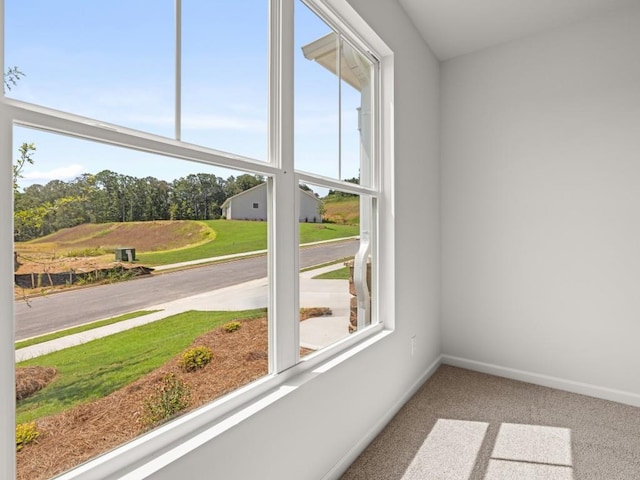 unfurnished sunroom featuring plenty of natural light