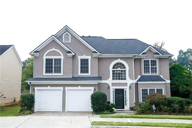 4000 Longlake Dr, Duluth, GA 30097 - traditional-style house featuring stucco siding, driveway, and a garage