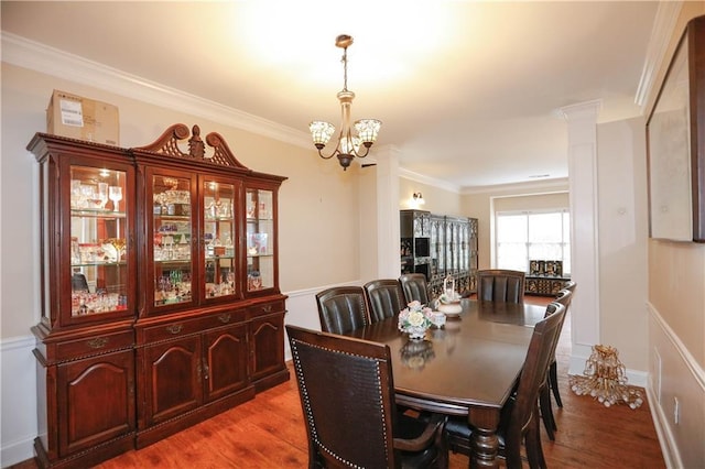 4000 Longlake Dr, Duluth, GA 30097 - dining area with a chandelier, wood finished floors, and crown molding