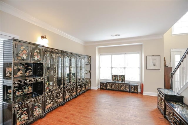 4000 Longlake Dr, Duluth, GA 30097 - wine room with wood finished floors, ornamental molding, baseboards, and healthy amount of natural light