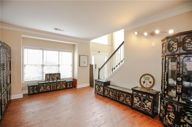 4000 Longlake Dr, Duluth, GA 30097 - foyer entrance featuring wood finished floors, ornamental molding, stairway, and baseboards