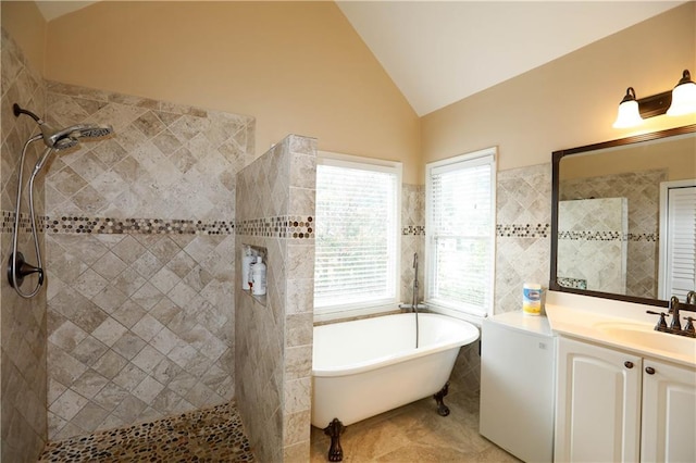 4000 Longlake Dr, Duluth, GA 30097 - full bathroom with lofted ceiling, a walk in shower, vanity, a soaking tub, and tile walls