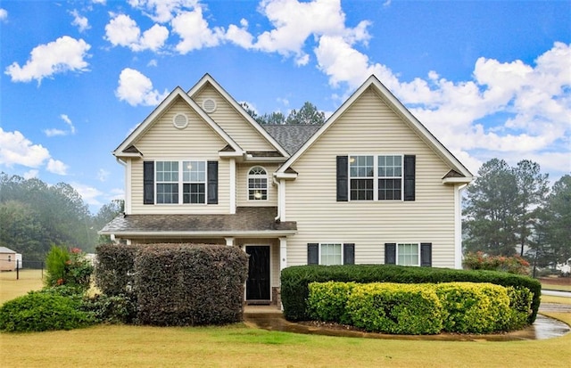 view of front facade with a front yard