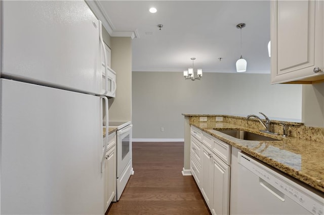 kitchen with dark hardwood / wood-style flooring, light stone countertops, sink, crown molding, and white appliances