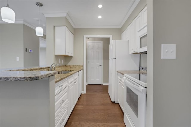 kitchen featuring ornamental molding, range, dark wood-type flooring, hanging light fixtures, and white cabinets