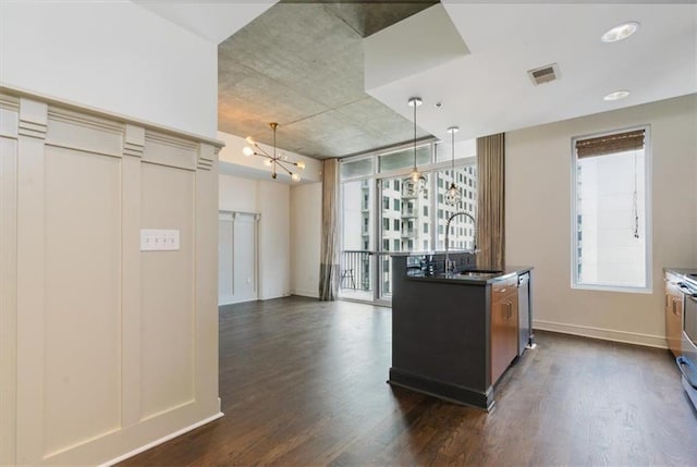 44 Peachtree Pl NW Unit 1728, Atlanta, GA 30309 - kitchen with dark wood-style floors, healthy amount of natural light, and dishwasher