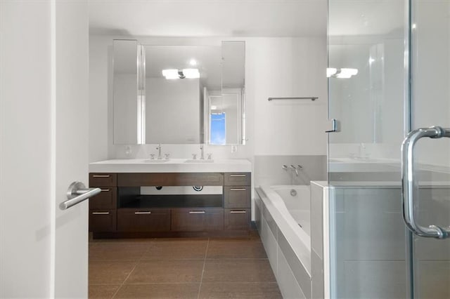 bathroom featuring vanity, separate shower and tub, and tile patterned flooring