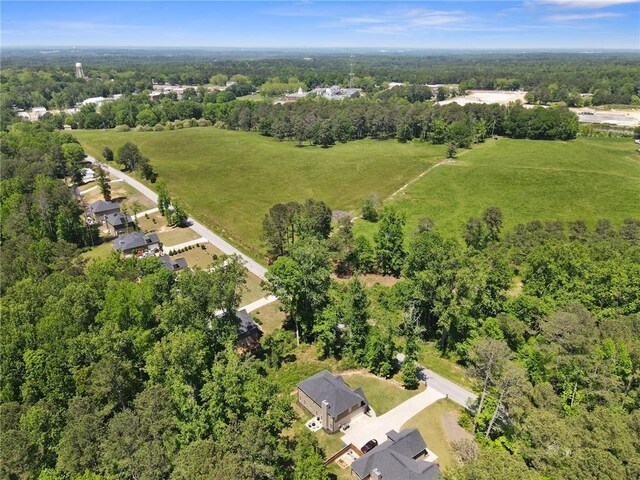bird's eye view featuring a view of trees