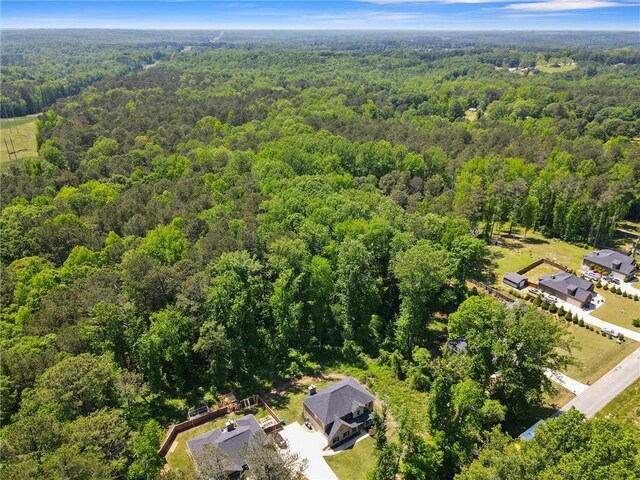aerial view featuring a forest view