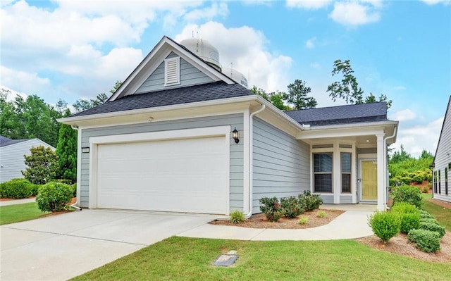 6003 Rollingwood Way, Hoschton, GA 30548 - view of front facade featuring concrete driveway, roof with shingles, a front lawn, and an attached garage
