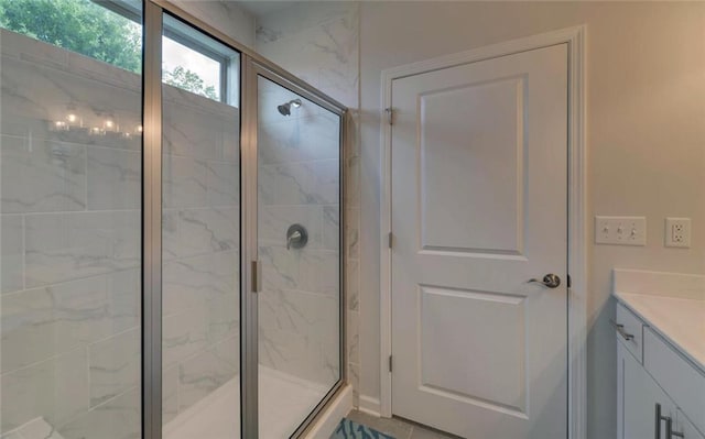 6003 Rollingwood Way, Hoschton, GA 30548 - full bath with a marble finish shower and vanity