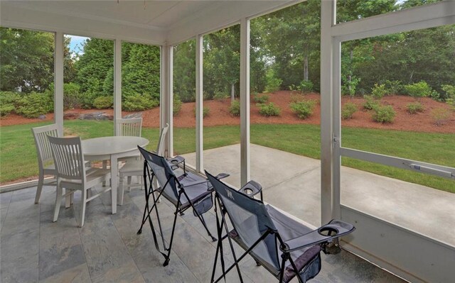 6003 Rollingwood Way, Hoschton, GA 30548 - sunroom / solarium featuring outdoor dining area