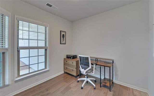 6003 Rollingwood Way, Hoschton, GA 30548 - home office with wood finished floors and baseboards