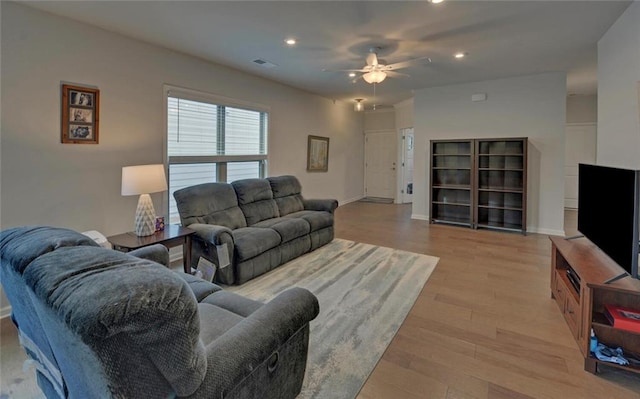 6003 Rollingwood Way, Hoschton, GA 30548 - living room with recessed lighting, a ceiling fan, and light wood finished floors