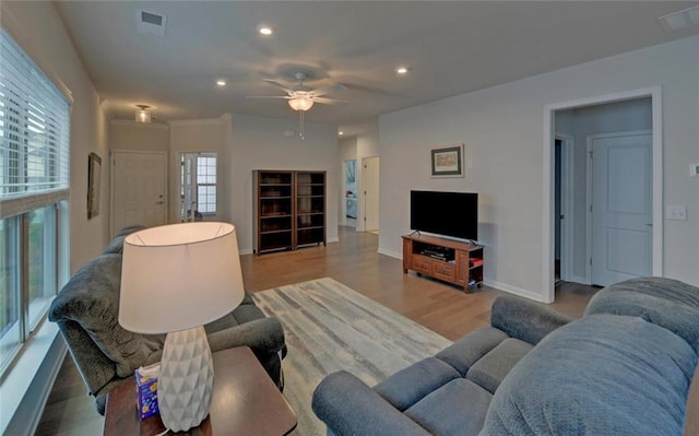 6003 Rollingwood Way, Hoschton, GA 30548 - living room with recessed lighting, light wood-type flooring, and a ceiling fan