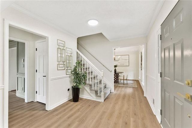 5759 Albans Way, Lithonia, GA 30058 - foyer with stairs, light wood-type flooring, ornamental molding, and baseboards