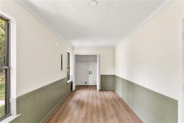 5759 Albans Way, Lithonia, GA 30058 - hall featuring a wainscoted wall, healthy amount of natural light, light wood-style floors, and crown molding