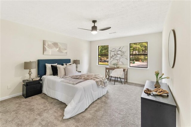 5759 Albans Way, Lithonia, GA 30058 - carpeted bedroom featuring baseboards, a ceiling fan, and a textured ceiling