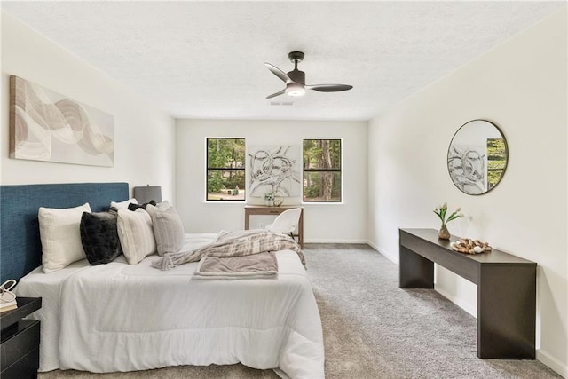 5759 Albans Way, Lithonia, GA 30058 - bedroom with carpet, a textured ceiling, ceiling fan, and baseboards