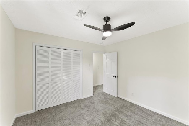 5759 Albans Way, Lithonia, GA 30058 - unfurnished bedroom featuring carpet floors, baseboards, a closet, and ceiling fan