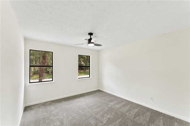5759 Albans Way, Lithonia, GA 30058 - spare room featuring a ceiling fan, carpet, baseboards, and a textured ceiling