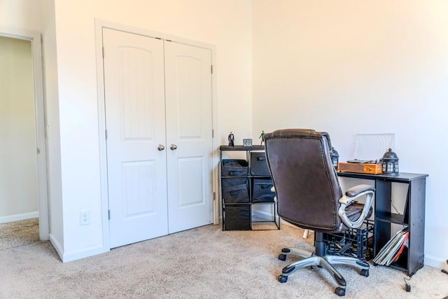 home office featuring light colored carpet