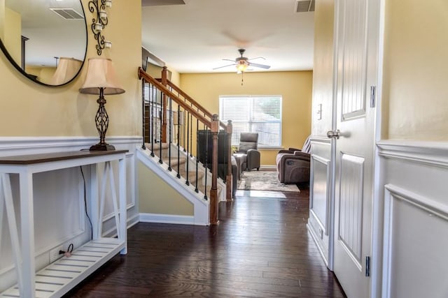 entrance foyer featuring ceiling fan and dark hardwood / wood-style flooring