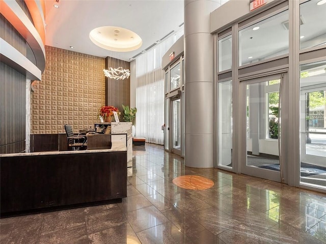 welcome area with an inviting chandelier