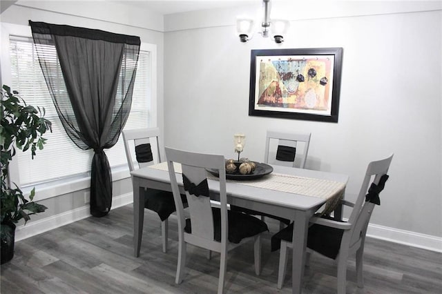 3046 Dobbs Way, East Point, GA 30344 - dining room featuring dark wood finished floors, baseboards, and a chandelier