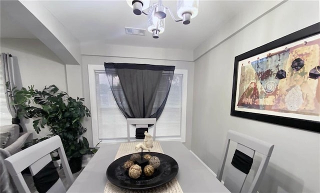 3046 Dobbs Way, East Point, GA 30344 - dining room featuring a chandelier