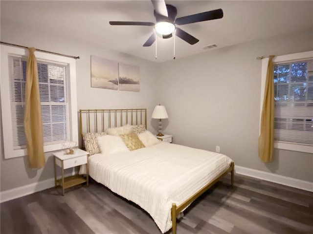 3046 Dobbs Way, East Point, GA 30344 - bedroom with baseboards, wood finished floors, and ceiling fan