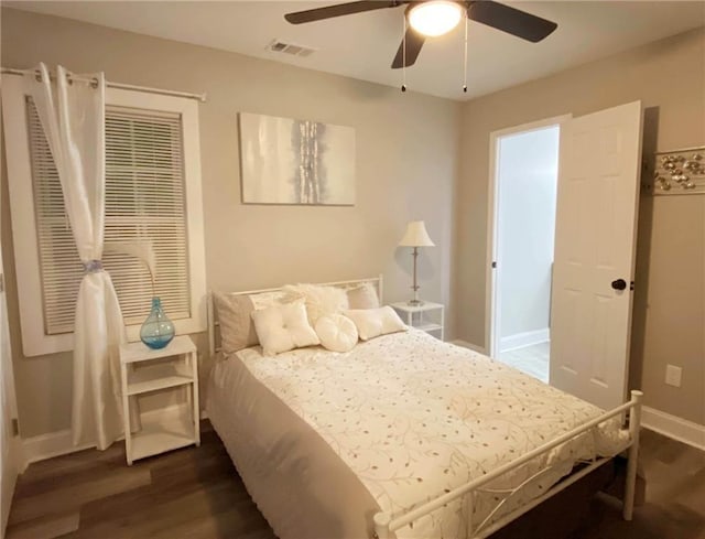 3046 Dobbs Way, East Point, GA 30344 - bedroom with dark wood-style floors, baseboards, and ceiling fan