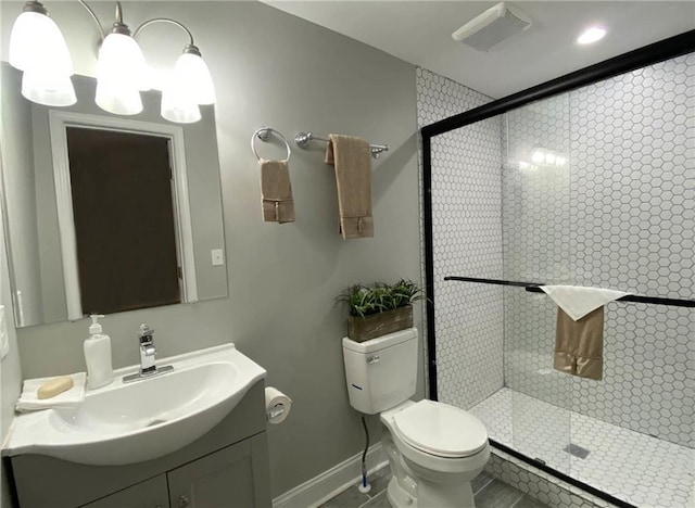 3046 Dobbs Way, East Point, GA 30344 - full bathroom featuring vanity, toilet, a stall shower, baseboards, and tile patterned floors