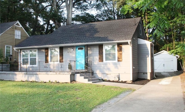3046 Dobbs Way, East Point, GA 30344 - view of front of home featuring a front yard, a shingled roof, a porch, and concrete driveway