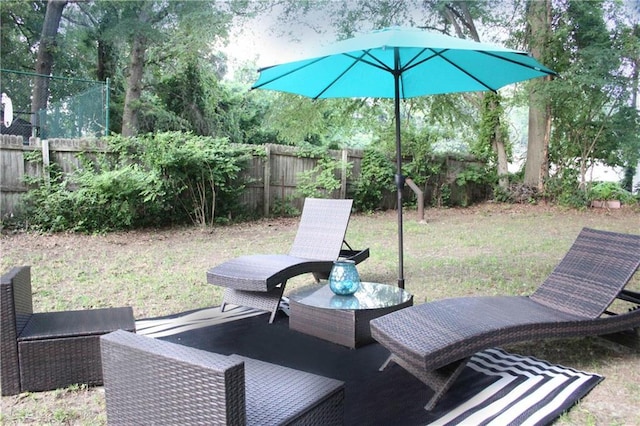 3046 Dobbs Way, East Point, GA 30344 - fenced backyard featuring a patio