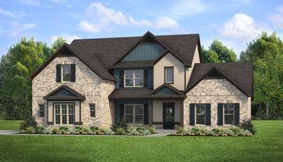 18 Slick Ct, Senoia, GA 30276 - view of front of home featuring a front lawn and stone siding