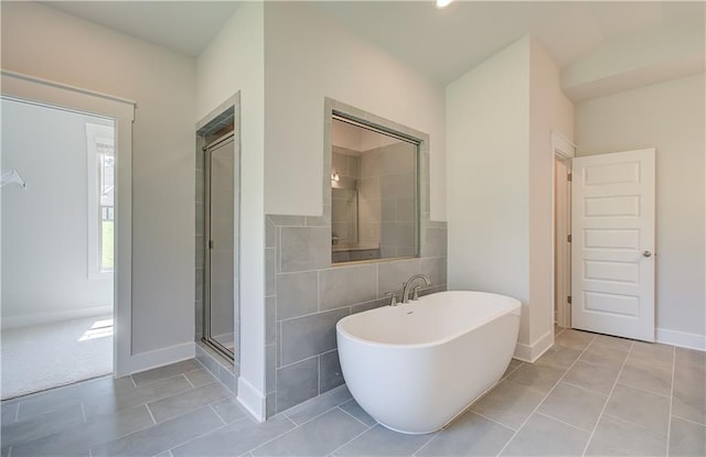 18 Slick Ct, Senoia, GA 30276 - full bathroom with a soaking tub, tile patterned flooring, a tile shower, and recessed lighting