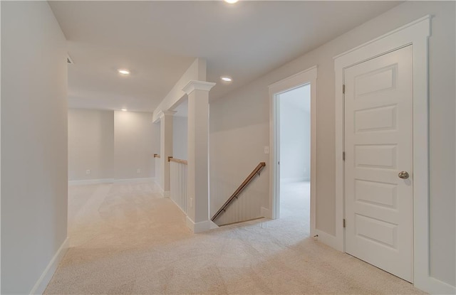 18 Slick Ct, Senoia, GA 30276 - hall featuring light colored carpet, an upstairs landing, recessed lighting, and ornate columns