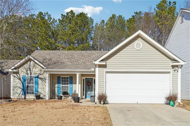 ranch-style house featuring a porch and a garage