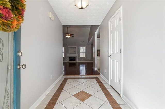 corridor with light tile patterned flooring