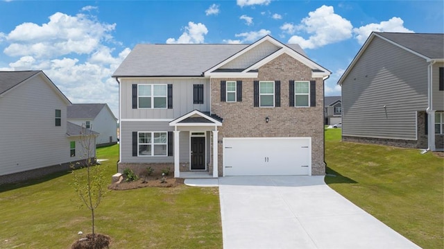 view of front of home with a garage and a front yard