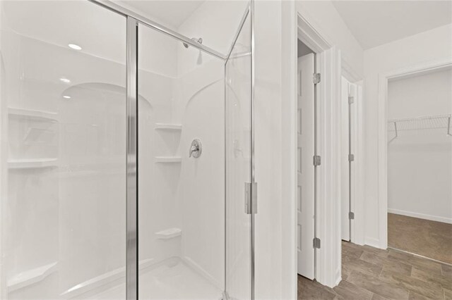 bathroom featuring walk in shower